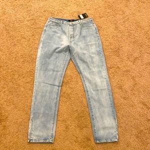 Blue jeans with slit at the bottom